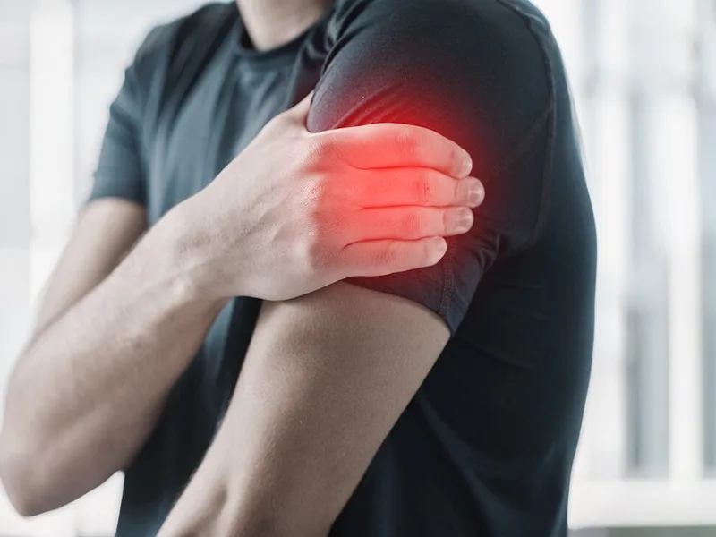 Restore24 Chiropractic treating arm pain in Overland Park