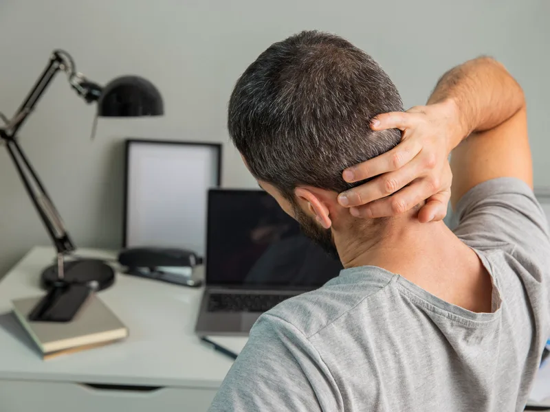 Restore24 Chiropractic treating neck pain in Overland Park